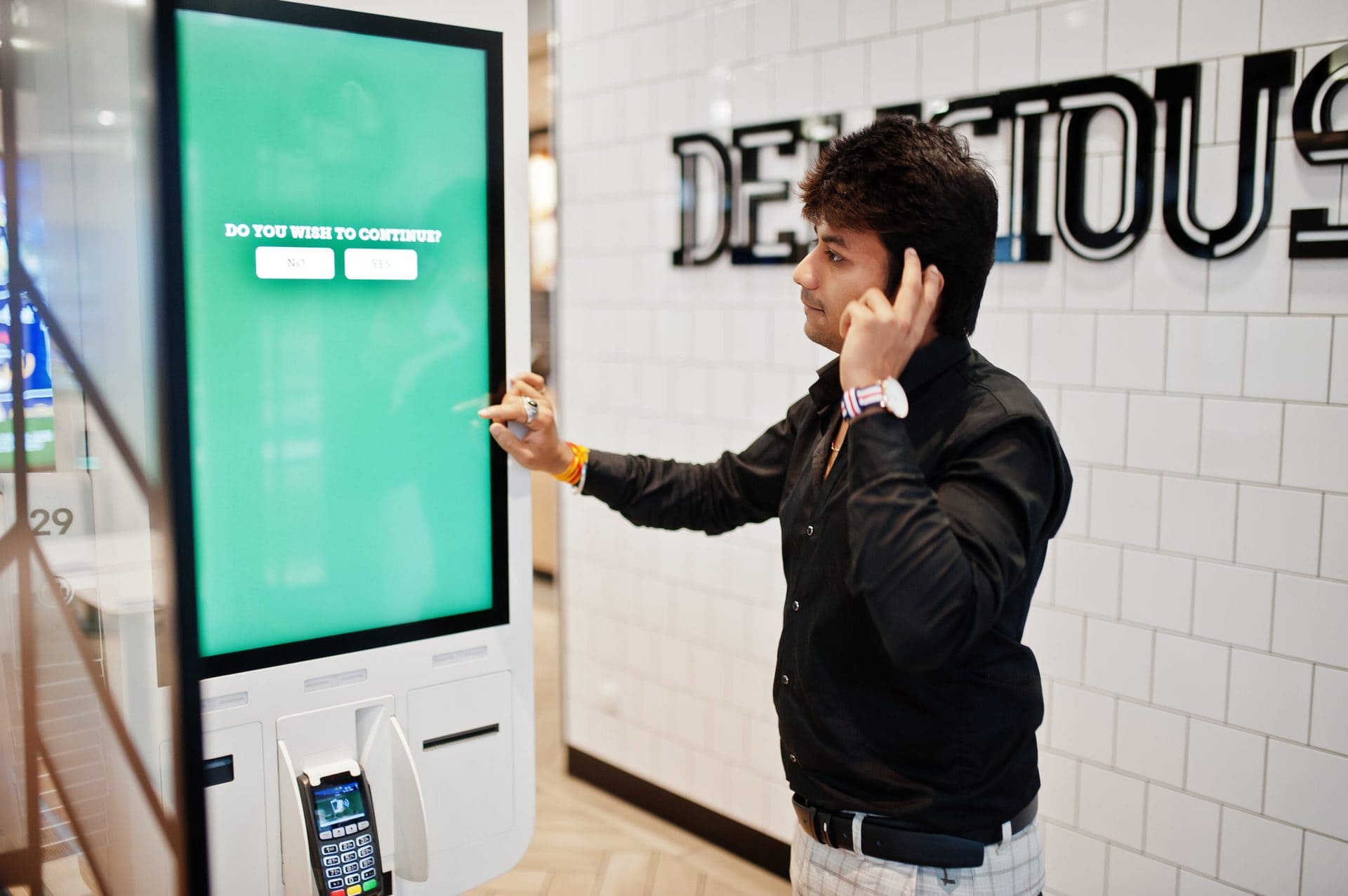 Self-service digital signage kiosk