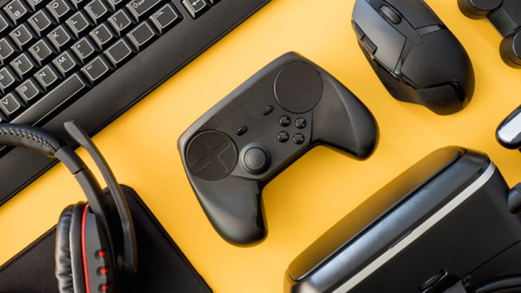 Gaming peripherals on a yellow background