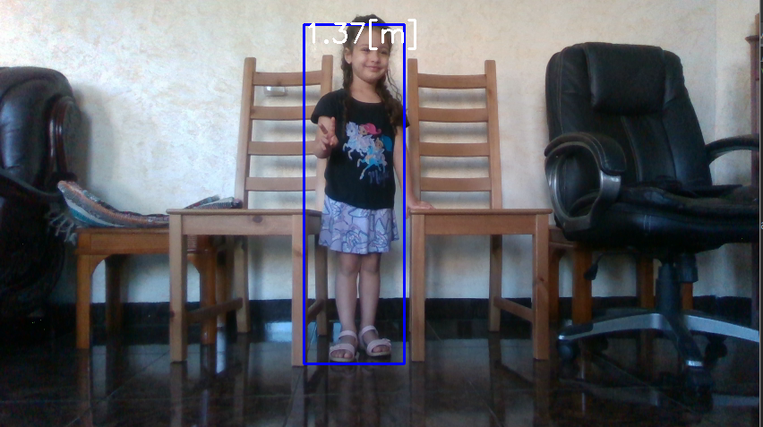 Image of a small child with a bounding box showing approximated height using TensorFlow and Intel RealSense Depth cameras